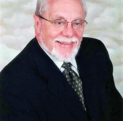 Venerable Gordon E.S. Guy, Archdeacon