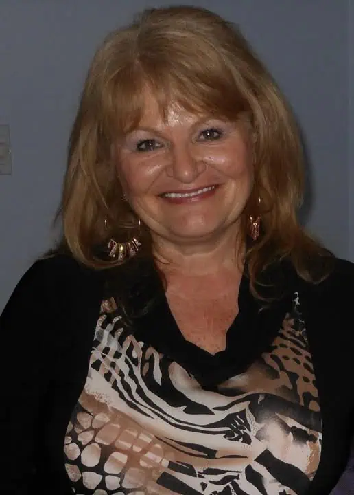 Mme Louise Fournier